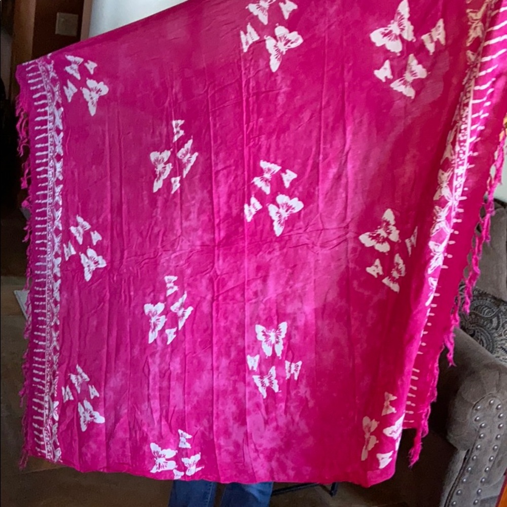 Beach cover up or towel or swimsuit cover up!